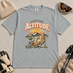 Granite gray t-shirt featuring a marmot resting in a chair with a mug, ski helmet and goggles beneath “Resting Altitude” text.