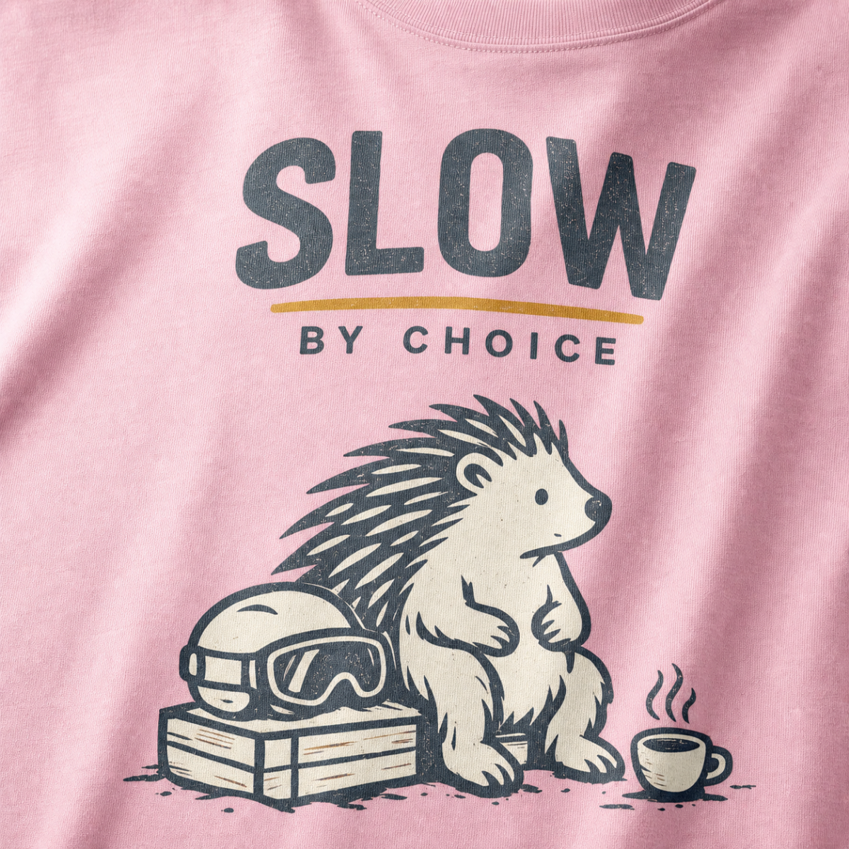 Close-up of a seated hedgehog resting beside ski goggles and a steaming mug under “Slow by Choice” lettering.