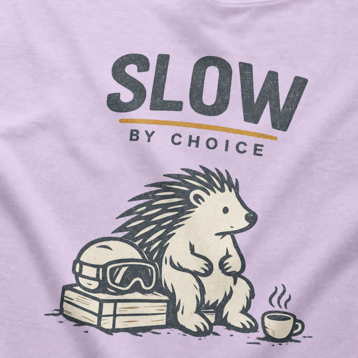 Close-up of a seated hedgehog resting beside ski goggles and a steaming mug under “Slow by Choice” lettering.
