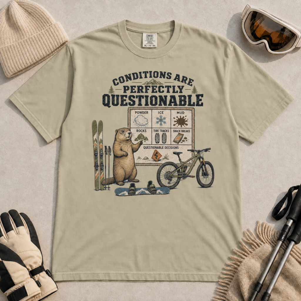 Khaki t-shirt featuring a marmot with skiing, snowboarding, and mountain biking gear under “Conditions Are Perfectly Questionable” text.