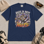 Navy blue t-shirt featuring a squirrel performing an aerial ski trick beneath the words “Hold My Nuts.”