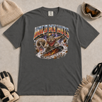 Pepper gray t-shirt featuring a squirrel snowboarding through flying acorns beneath the words “Hold My Nuts.”