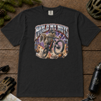 Black t-shirt featuring a squirrel mountain biking through flying acorns beneath the words “Hold My Nuts.”