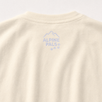 Ivory colored fabric with 'Alpine Pals' logo embroidered on a light gray background