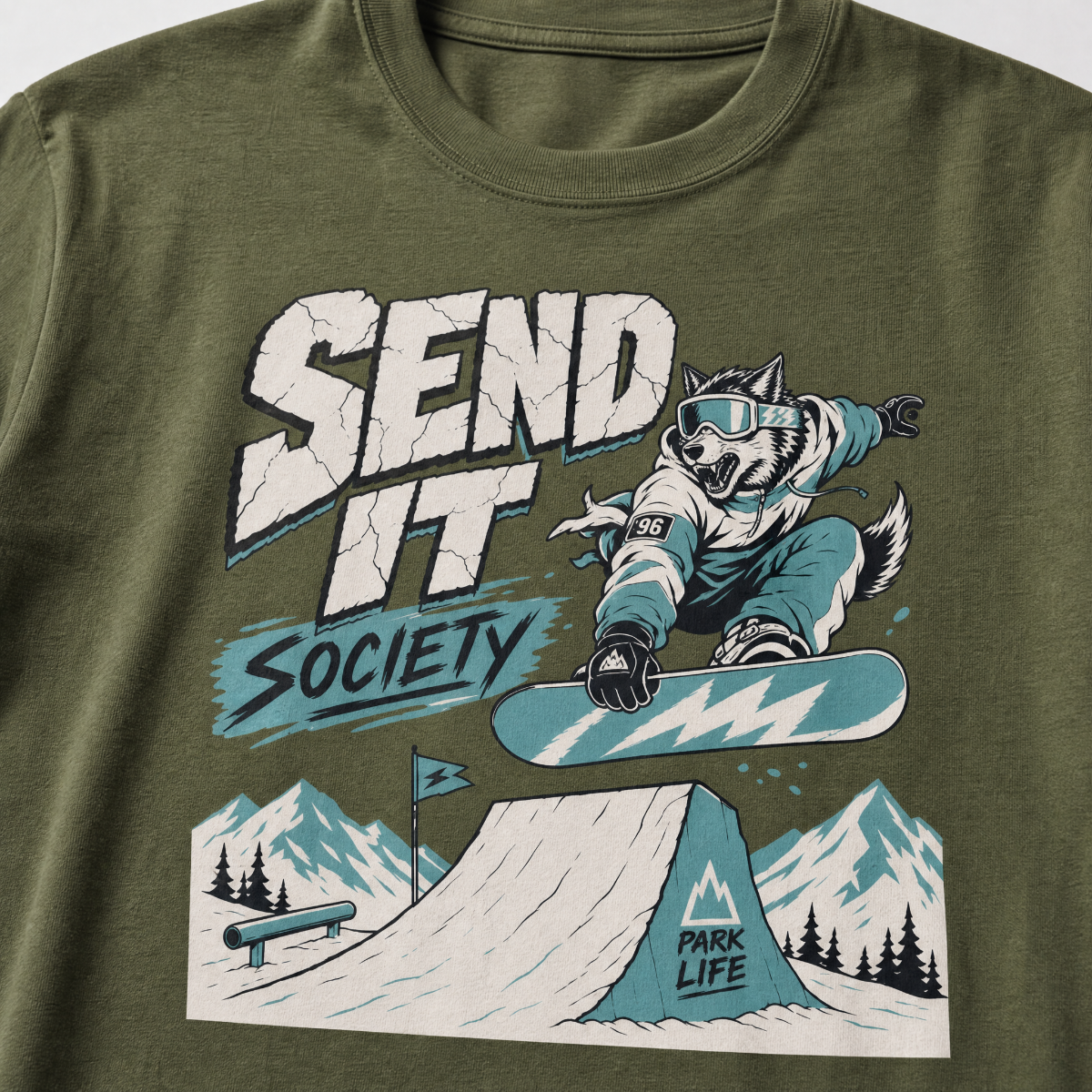Hemp green t-shirt with a graphic of a snowboarder and 'Send It Society' text on a mountain background.