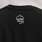 Black t-shirt with 'Alpine Pals' logo on a gray background