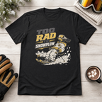 Black t-shirt with snowplow graphic and text on a wooden surface with gloves and hot chocolate.
