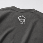 Pepper gray shirt with 'Alpine Pals' logo on a light gray background