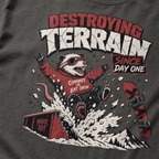 T-shirt with a graphic of a rat wearing goggles and a red jacket, with text 'Destroying Terrain Since Day One' on a dark gray background.