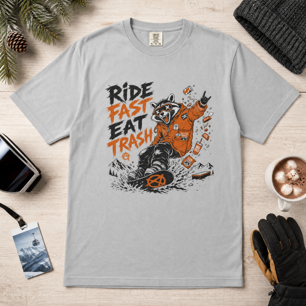 Granite gray t-shirt with a graphic design featuring a bear and text on a wooden surface with accessories.