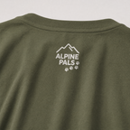 Green t-shirt with 'Alpine Pals' logo on a white background