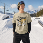 Person wearing a t-shirt with a chairlift graphic in a snowy mountain setting