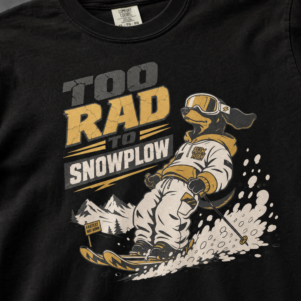 Black t-shirt with a graphic of a person snowplowing and text 'Too Rad to Snowplow' on a plain background.