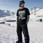 Person wearing a 'Park Rat' t-shirt in a snowy mountain setting