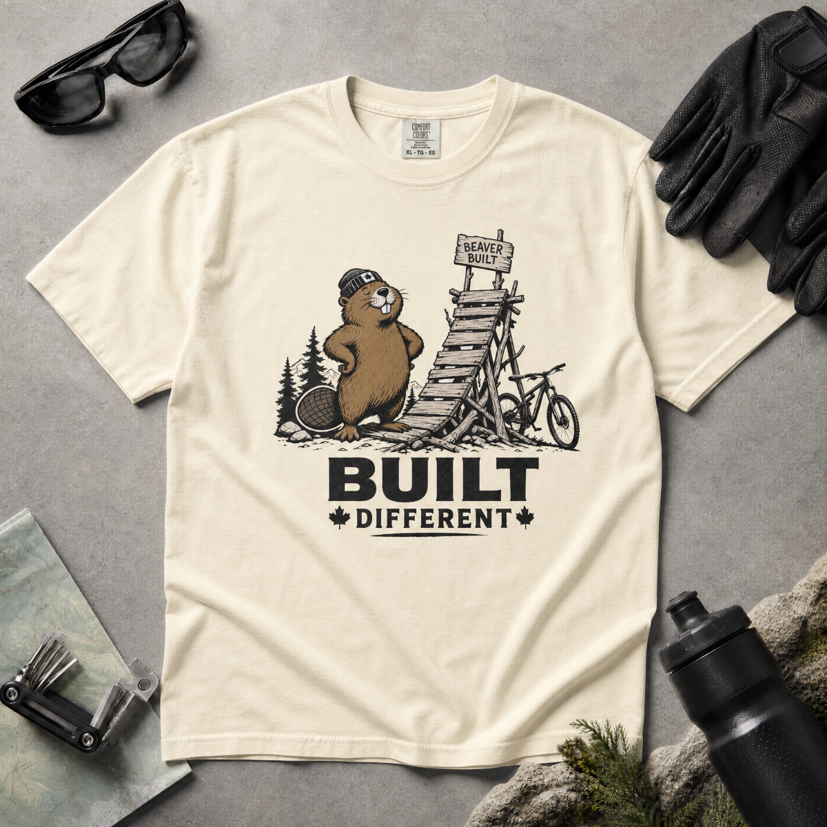 Ivory white t-shirt with beaver graphic and 'Built Different' text.