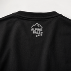 Black shirt with Alpine Pals logo on a white background