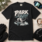 Black t-shirt with 'Park Rat' graphic on a wooden surface with winter accessories.