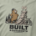 Bay green t-shirt with beaver graphic and 'Built Different' text.
