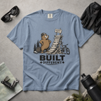 Blue jean colored t-shirt with a beaver graphic and 'Built Different' text.