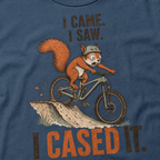 Midnight blue t-shirt with a graphic of a squirrel on a bike and text 'I Came. I Saw. I Cased It.'