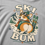 Granite gray t-shirt with a corgi graphic and 'Ski Bum' text on a mountainous background.