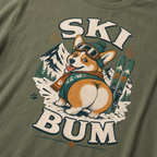 T-shirt with a corgi graphic and 'Ski Bum' text on a moss green background