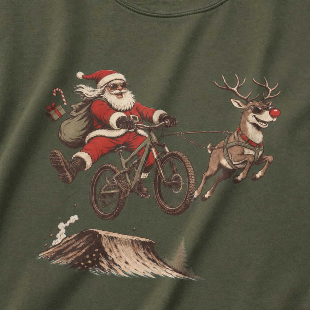 Hemp green t-shirt with a graphic of Santa Claus riding a bike with a reindeer.