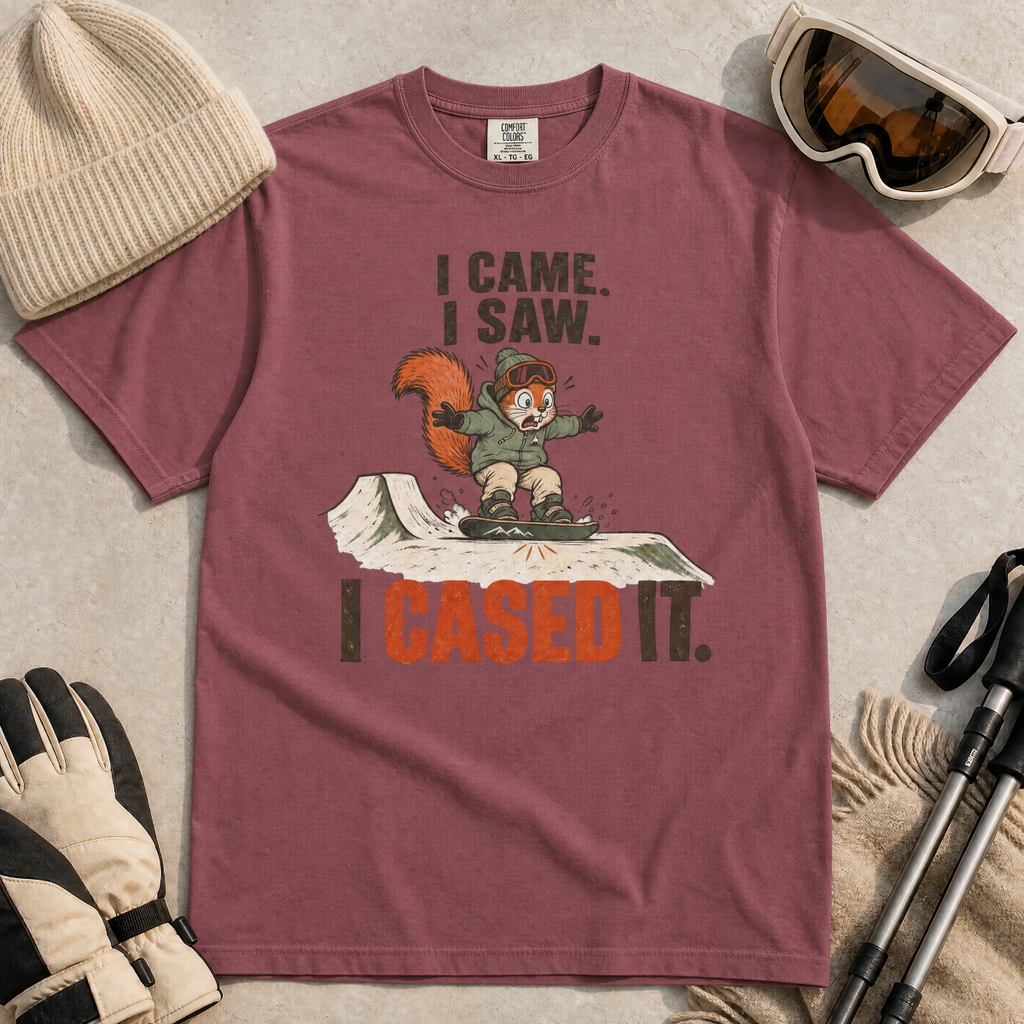 Brick red t-shirt of a squirrel snowboarding with text, "I CAME. I SAW. I CASED IT"