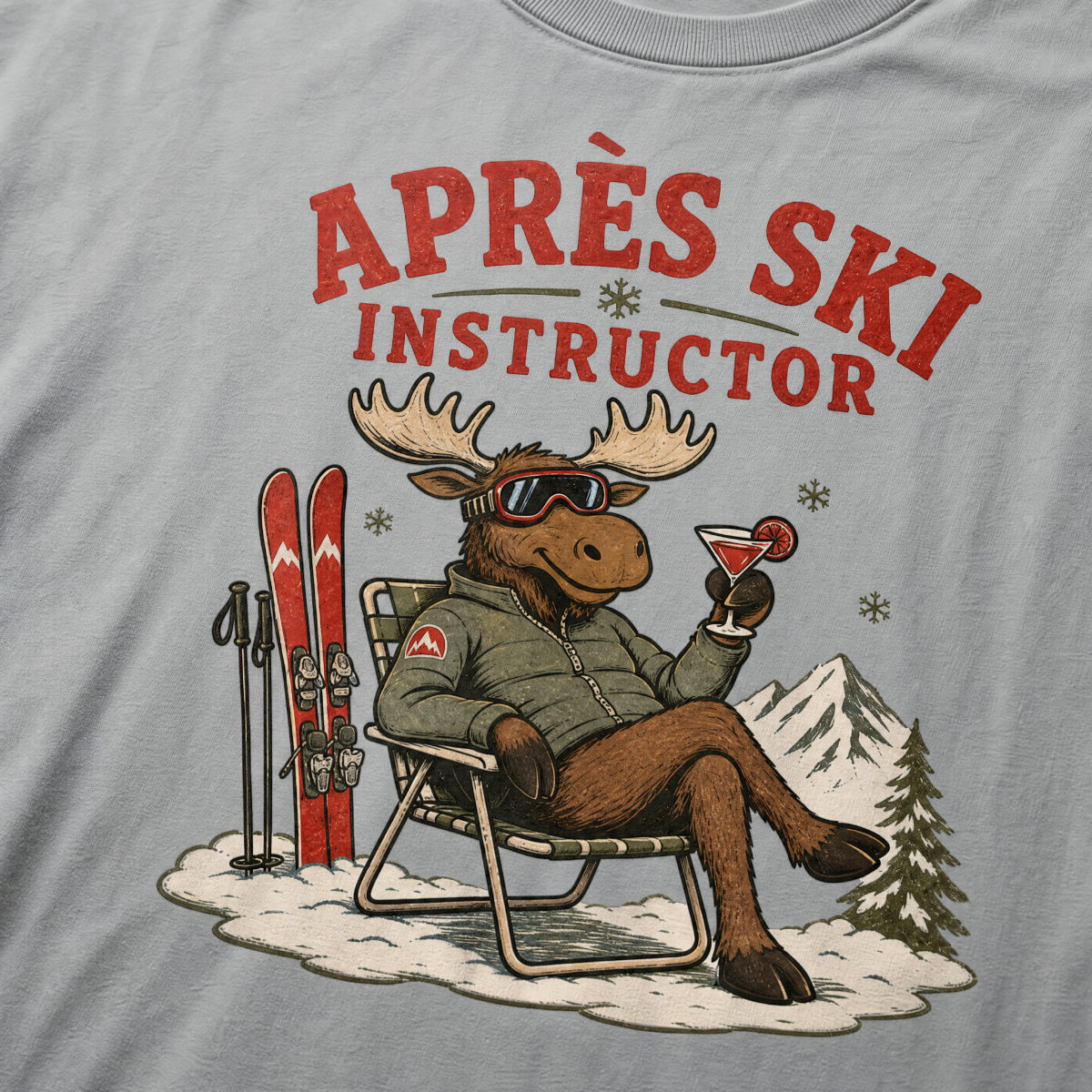 Granite gray t-shirt with a moose graphic and 'Après Ski Instructor' text on a snowy background.