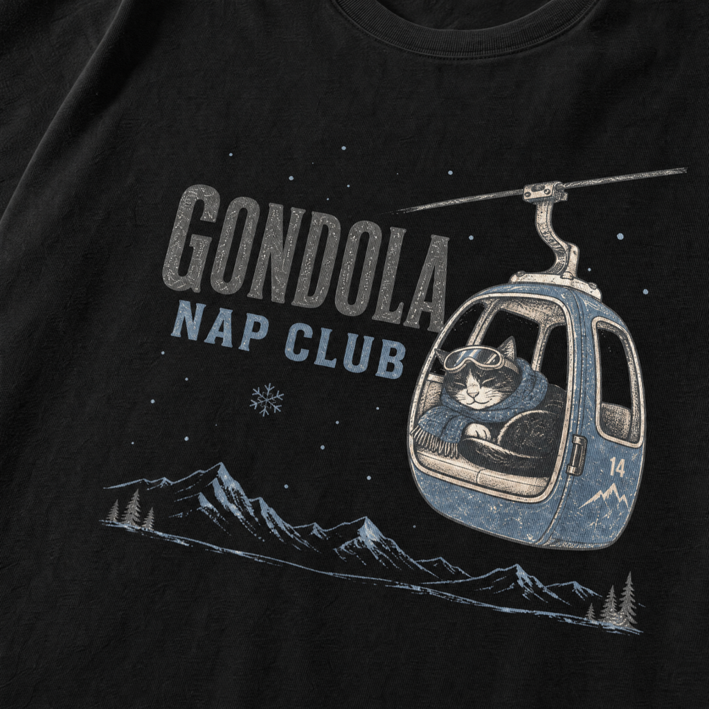 Black t-shirt featuring a cat napping in a ski gondola with text, "Gondola Nap Club".