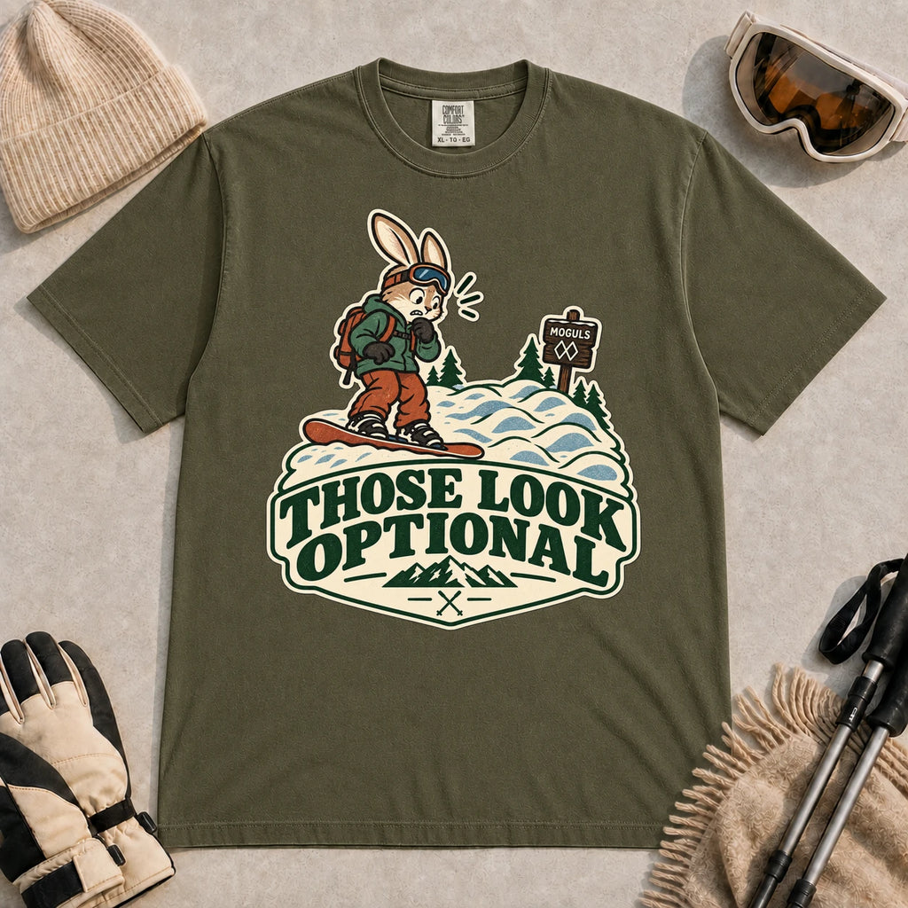 Hemp tee featuring a cautious bunny snowboarder facing a mogul run beside a “Moguls” sign above the phrase “Those Look Optional.”