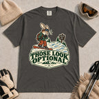 Pepper tee featuring a cautious bunny snowboarder facing a mogul run beside a “Moguls” sign above the phrase “Those Look Optional.”