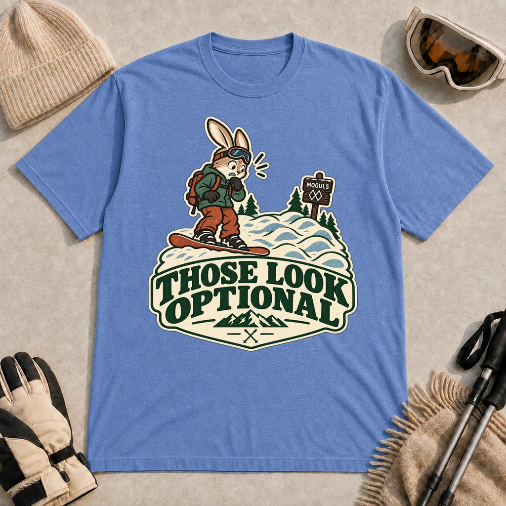 Heather Royal tee featuring a cautious bunny snowboarder facing a mogul run beside a “Moguls” sign above the phrase “Those Look Optional.”