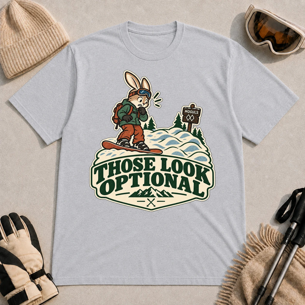 Sport Grey tee featuring a cautious bunny snowboarder facing a mogul run beside a “Moguls” sign above the phrase “Those Look Optional.”