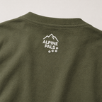 Green shirt with 'Alpine Pals' logo on a white background