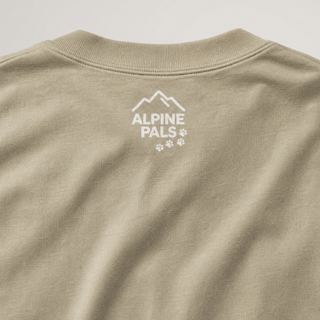 Beige sweatshirt with 'Alpine Pals' logo on a light gray background