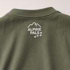 Moss green shirt with 'Alpine Pals' logo on a white background