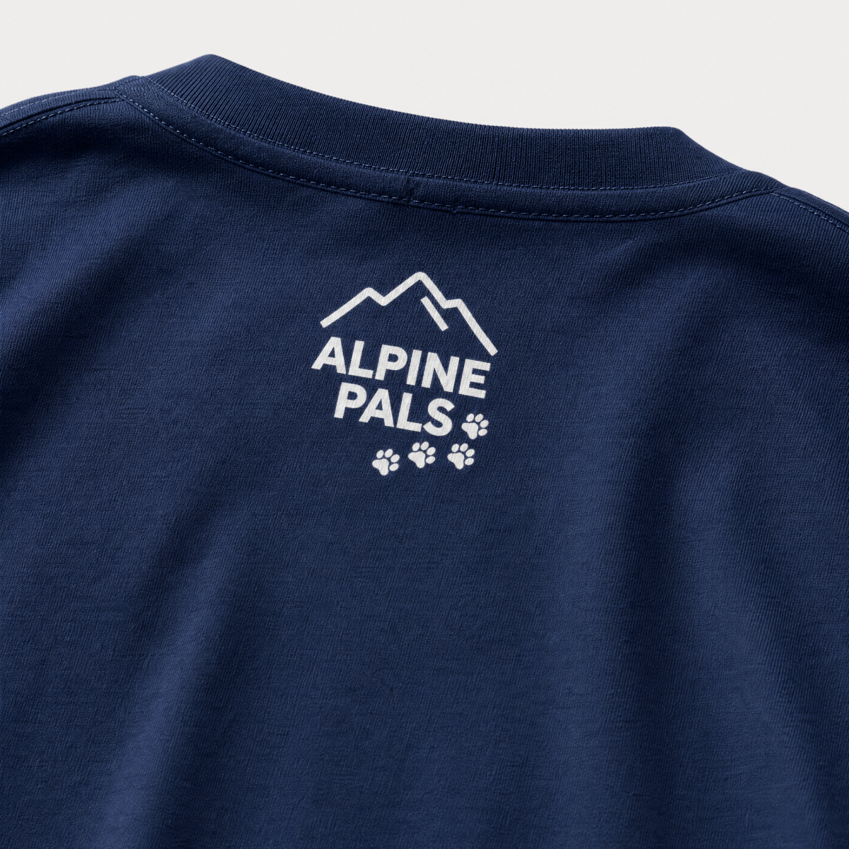 Navy blue shirt with 'Alpine Pals' logo on a white background