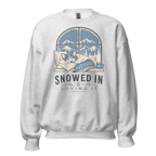 Ash gray sweatshirt with a graphic of a dog by a window and 'Snowed In & Loving It' text on a white background