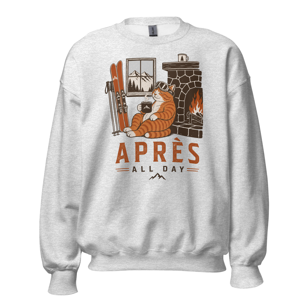Ash gray sweatshirt with a graphic of a cat by a fireplace and 'APRES ALL DAY' text.