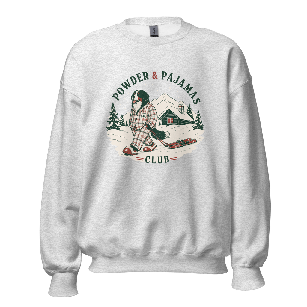 Ash gray sweatshirt with a graphic of a person in plaid pajamas and text 'Powder & Pajamas Club'.