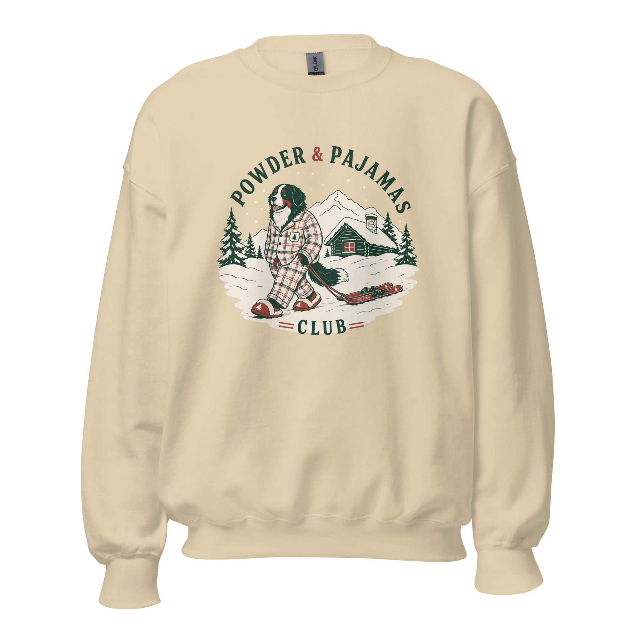 Sand colored sweatshirt with a graphic of a person in plaid pajamas and skis, with 'Powder & Pajamas Club' text.