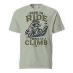 Bay green t-shirt with a graphic of a raccoon riding a bike and text 'Born to Ride, Forced to Climb'.