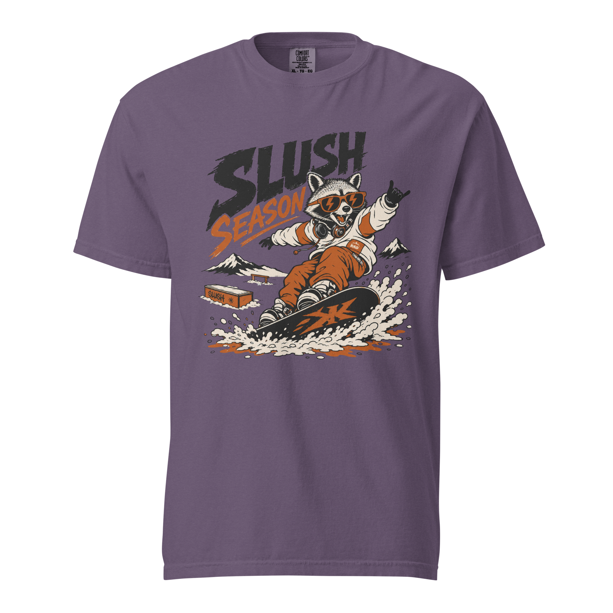 Purple t-shirt with a graphic of a raccoon snowboarding and 'Slush Season' text on a white background