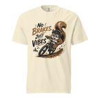 Beige t-shirt with a graphic of a squirrel riding a bike and text 'No Brakes, Just Vibes' on a white background.