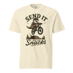 Ivory white t-shirt with graphic of an otter on a bike and text 'Send it for the snacks'.