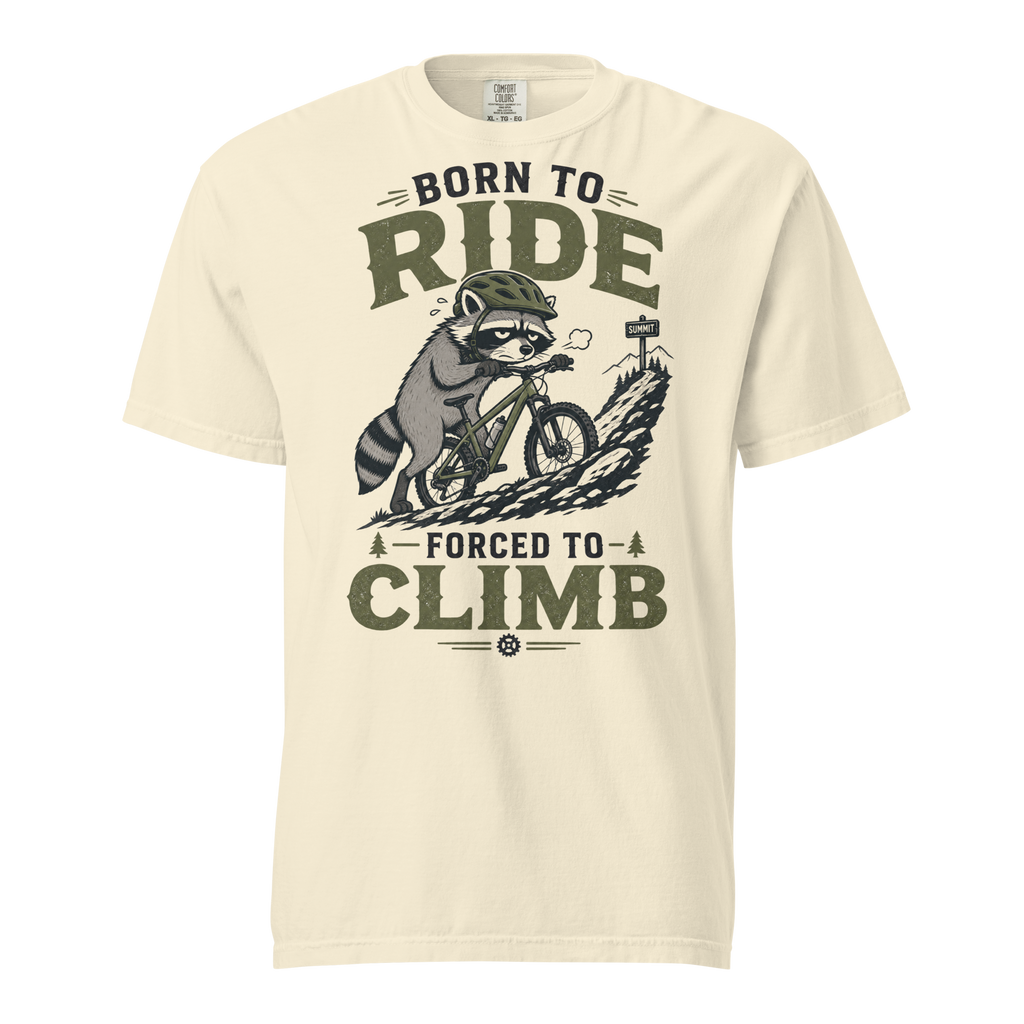 Ivory white t-shirt with a graphic of a raccoon riding a bike and text 'Born to Ride, Forced to Climb'.