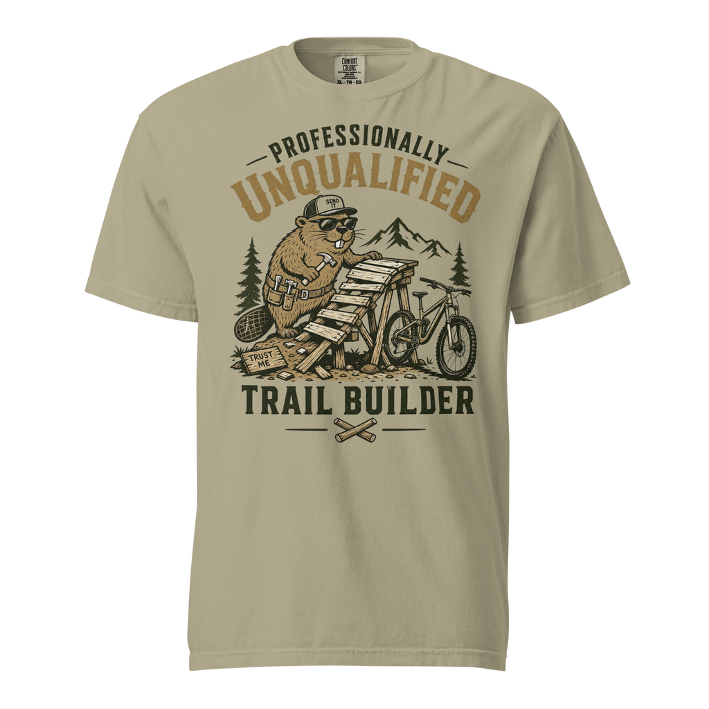Beige t-shirt with graphic design of a beaver on a motorcycle and text 'Professionally Unqualified Trail Builder' on a white background.