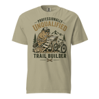 Beige t-shirt with graphic design of a beaver on a motorcycle and text 'Professionally Unqualified Trail Builder' on a white background.