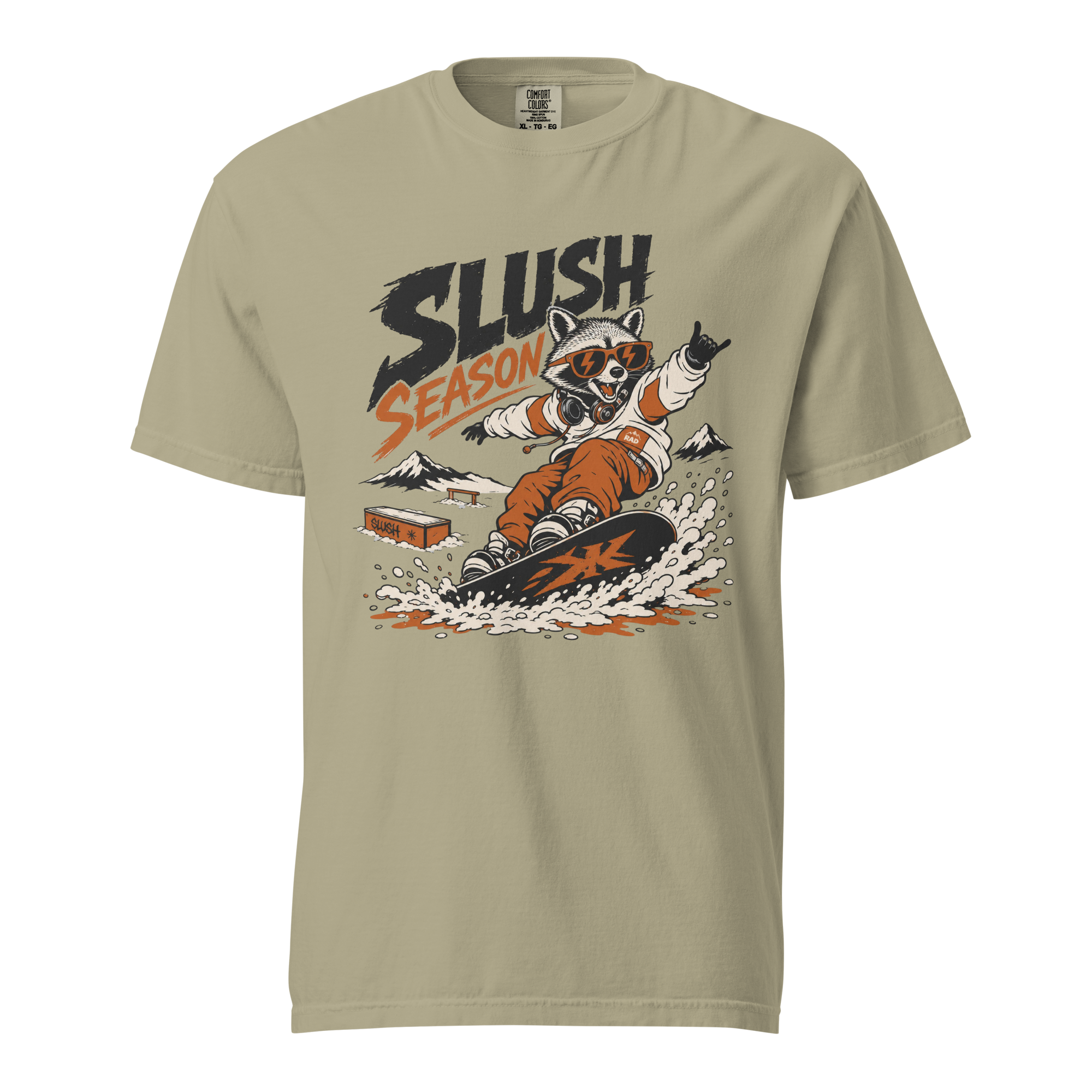 Khaki t-shirt with a graphic of a raccoon snowboarding and 'Slush Season' text on a white background